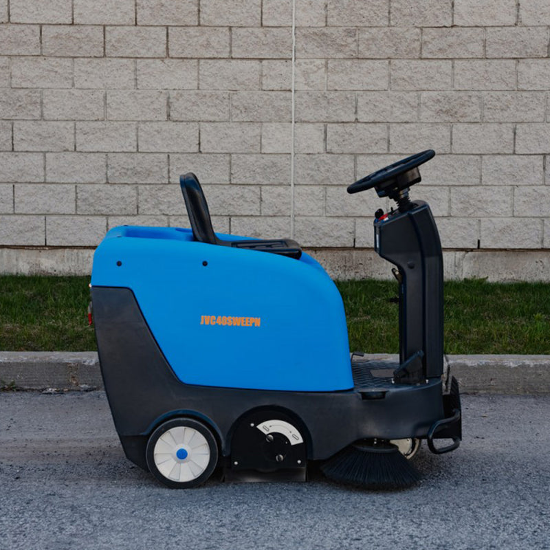 Right face view of Johnny Vac Industrial Ride-On Sweeper Machine JVC40SWEEPN on the road