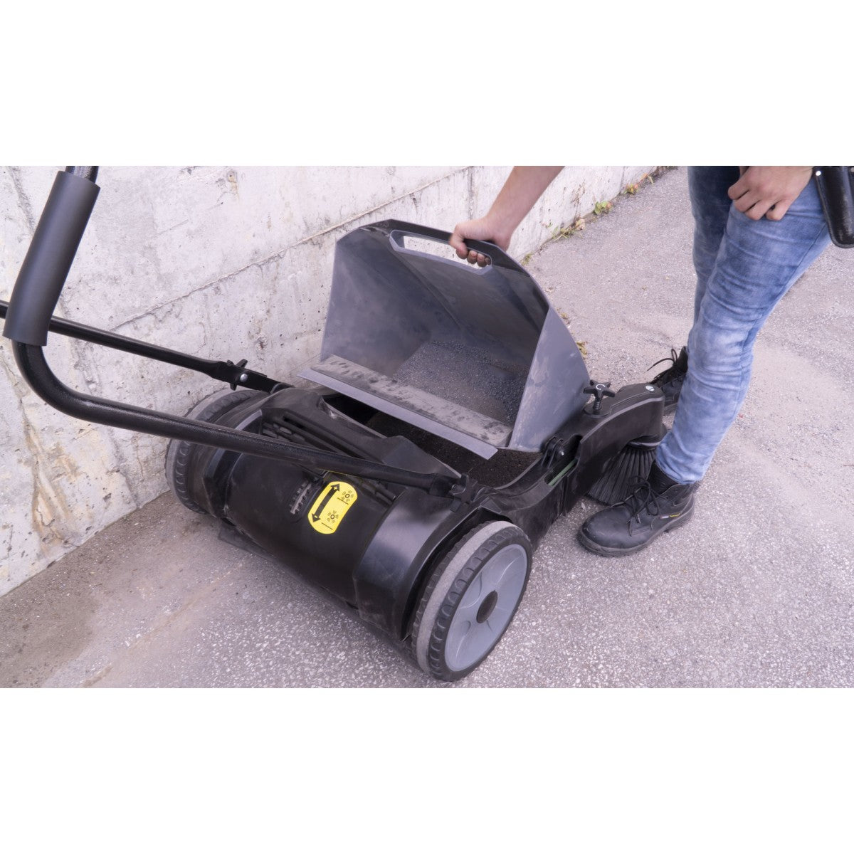 Dust collecting bin of Johnny Vac Manual Floor Sweeper JV320 on road

