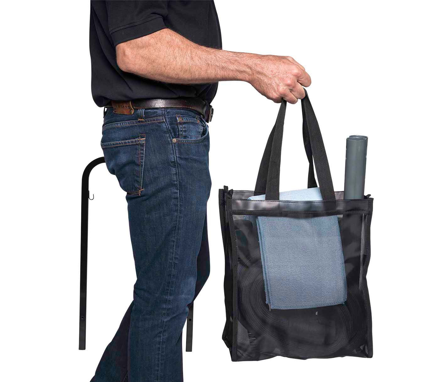 Worker carrying the Vapamore MR-1000 Forza Commercial Steamer for easy portability.
