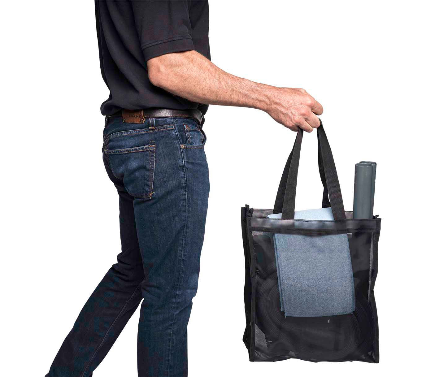 Worker carrying the Vapamore MR-1000 Forza Commercial Steamer in a bag for easy storage.