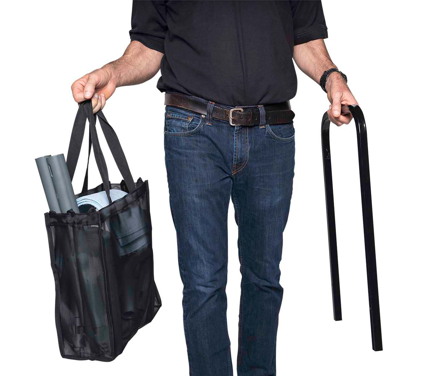 Front view of a worker carrying the Vapamore MR-1000 Forza Commercial Steamer.