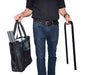 Front view of a worker carrying the Vapamore MR-1000 Forza Commercial Steamer.
